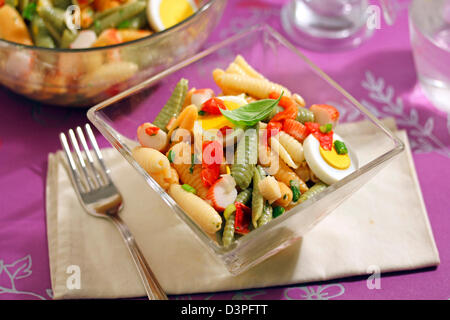 Pasta shells salad with basil. Recipe available. Stock Photo