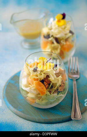 Escarole salad with tangerines. Recipe available. Stock Photo