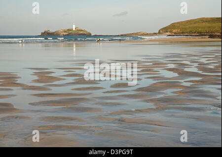 On the North Cornwall coast at St Ives Bay, looking north towards the lighthouse at Godrevy Point Stock Photo