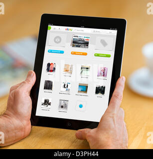 Looking at one's account page with the ebay app on a 4th generation Apple iPad, UK Stock Photo