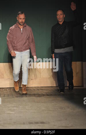 NEW YORK, NY - FEBRUARY 12: Designers Steven Cox (L) and Daniel Silver walk the runway at the Perry Ellis by Duckie Brown Fall 2013 fashion show during Mercedes-Benz Fashion Week at Highline Stages on February 12, 2013 in New York City. Stock Photo