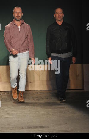 NEW YORK, NY - FEBRUARY 12: Designers Steven Cox (L) and Daniel Silver walk the runway at the Perry Ellis by Duckie Brown Fall 2013 fashion show during Mercedes-Benz Fashion Week at Highline Stages on February 12, 2013 in New York City. Stock Photo