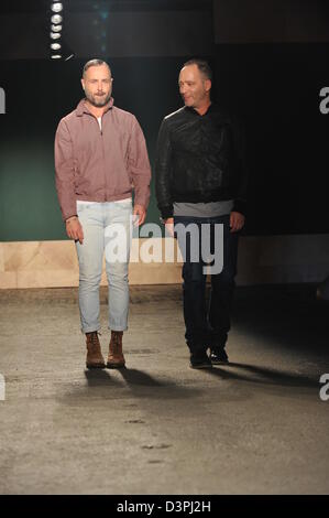 NEW YORK, NY - FEBRUARY 12: Designers Steven Cox (L) and Daniel Silver walk the runway at the Perry Ellis by Duckie Brown Fall 2013 fashion show during Mercedes-Benz Fashion Week at Highline Stages on February 12, 2013 in New York City. Stock Photo