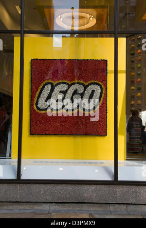 Lego logo in the Lego store shop window in the Rockefellar Plaza, New York Stock Photo