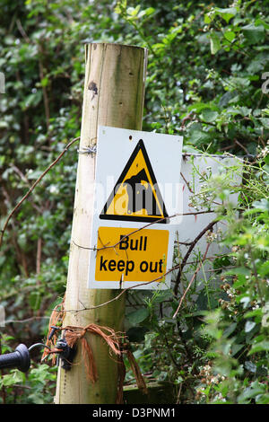 A warning sign on a farm saying Bull keep out Stock Photo