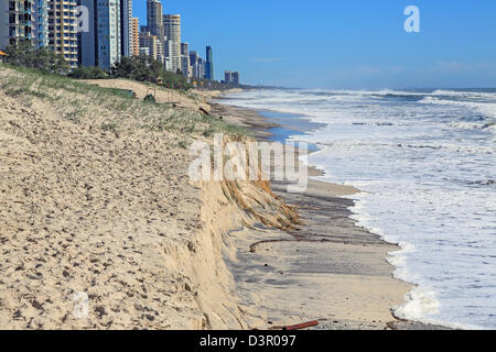 Beach erosion after storm activity Gold Coast Australia, pristine sandy beaches left with dangerous scarping and dark sands Stock Photo