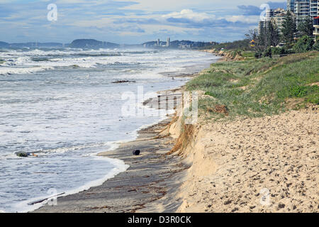 Beach erosion after storm activity Gold Coast Australia, pristine sandy beaches left with dangerous scarping and dark sands Stock Photo