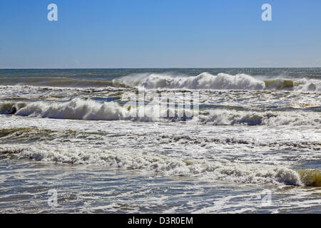 Beach erosion after storm activity Gold Coast Australia, pristine sandy beaches left with dangerous scarping and dark sands Stock Photo