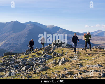 Hikers ascending Moel Faban in mountains of Snowdonia National Park above Bethesda, Gwynedd, North Wales, UK, Britain Stock Photo