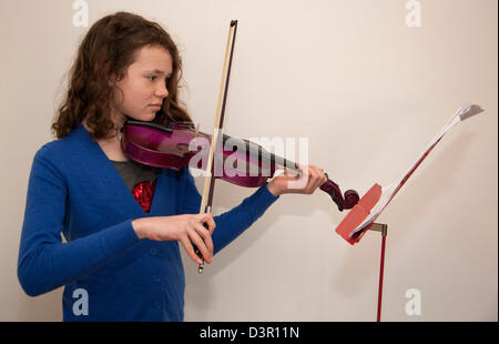 Young Girl Playing Violin Stock Photo