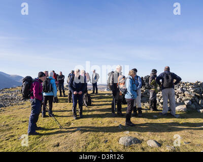 Ramblers group on top of Moel Faban in mountains of Snowdonia National Park above Bethesda, Gwynedd, North Wales, UK, Britain Stock Photo