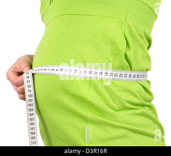 Pregnancy woman measures the stomach Stock Photo