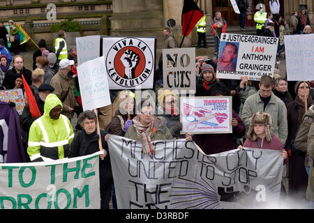 Manchester, UK. 23rd February 2013. Protesters at the Manchester Coalition Against Cuts rally in Manchester. The protesters gather outside the Town Hall after marching through the city centre to the Town Hall to listen to speakers call for a general strike against the government cuts.  Manchester, UK  23-02-2013 Credit:  John Fryer / Alamy Live News Stock Photo