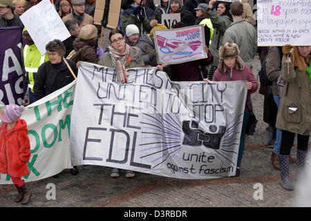Manchester, UK. 23rd February 2013. Protesters at the Manchester Coalition Against Cuts rally in Manchester. The protesters gather outside the Town Hall after marching through the city centre to the Town Hall to listen to speakers call for a general strike against the government cuts.  Manchester , UK  23-02-2013 Credit:  John Fryer / Alamy Live News Stock Photo