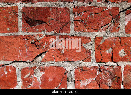 Cracked and old red brick wall Stock Photo