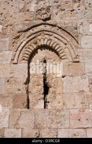Bullet holes left on wall near Zion gate as result of the 1948 Arab- Israel war. Stock Photo