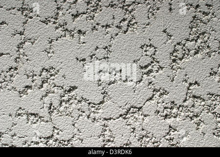 Grunge wall decorated by stone Stock Photo