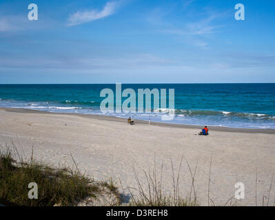 Surf Fishermen on a Lonely Florida beach Stock Photo