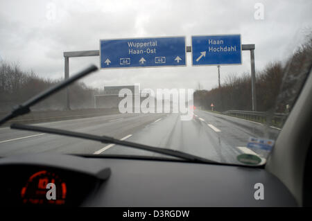 Driving in the rain on the A46 heading north towards Wuppertal, North Rhine-Westphalia, Germany. Stock Photo