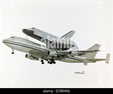 A glossy photo depicting the Space Shuttle Program, which ran from 1981 ...