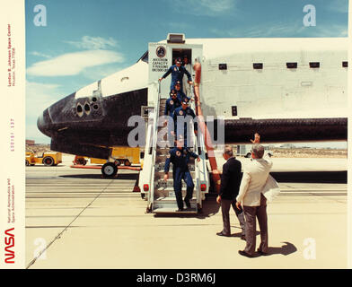 This glossy photo highlights the NASA Space Shuttle program, which ran ...