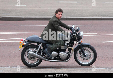 London, UK, 24th February 2013: Tom Cruise seen riding on a Triumph motorcycle while filming scenes from his latest movie 'All Y Stock Photo