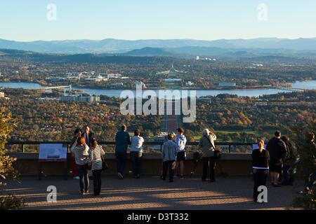 Tourists viewing city from Mt Ainslie lookout. Canberra, Australian Capital Territory (ACT), Australia Stock Photo