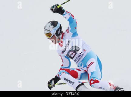 Garmisch-Partenkirchen, Germany, 24th Feb, 2013. France's Alexis Pinturault cheers after winning the Men's Giant Slalom race at the Alpine Skiing World Cup in Garmisch-Partenkirchen, Germany, 24 February 2013. Photo: KARL-JOSEF HILDENBRAND/dpa/Alamy Live News