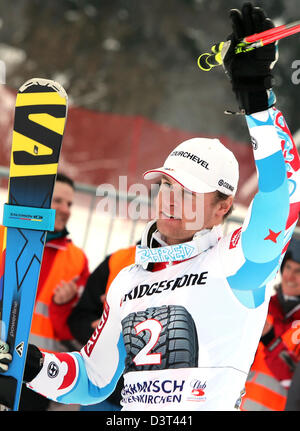 Garmisch-Partenkirchen, Germany, 24th Feb, 2013. France's Alexis Pinturault ceelbrates his victory in the Men's Giant Slalom race at the Alpine Skiing World Cup in Garmisch-Partenkirchen, Germany, 24 February 2013. Photo: KARL-JOSEF HILDENBRAND/dpa/Alamy Live News