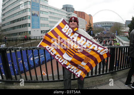 Supporter of League two Bradford City with club flag at Wembley for the 2013 League Cup Final sponsored by Capital one. London, UK, 24th February 2013 Stock Photo