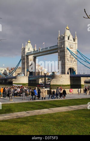 Tourists on a sunny winter's day at Tower Bridge London England UK GB Stock Photo