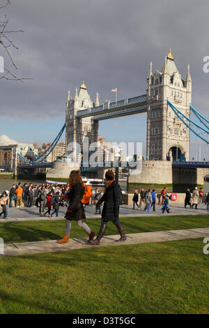 Tourists on a sunny winter's day at Tower Bridge London England UK GB Stock Photo