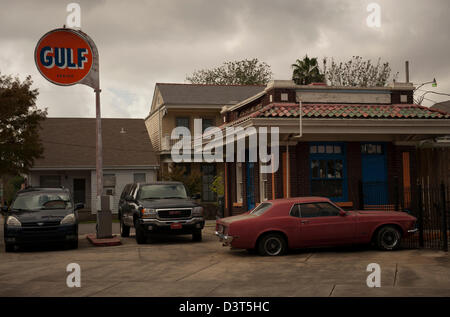 Old Gulf service station in the southern United States with gas pump and used cars. Stock Photo