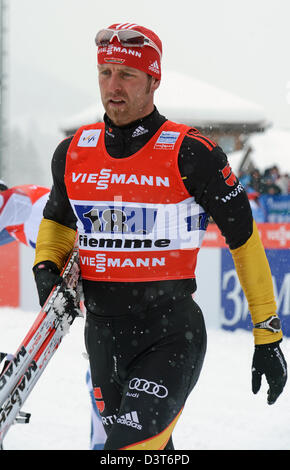 Val di Fiemme, Italy, 24th Feb, 2013. Axel Teichmann of Germany reacts after the Men's Cross Country 6 x 1,5 km Team Sprint at the Nordic Skiing World Championships in Val di Fiemme, Italy, 24 February 2013. Photo: Hendrik Schmidt/dpa +++(c) dpa - Bildfunk+++ Stock Photo