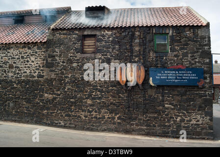 Smokehouse with kipper sign on wall, Craster, Northumberland, England Stock Photo