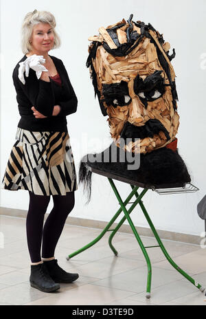 FILE - A file photo dated 21 February 2013 shows Dutch artist Eveline van Duyl presenting her portrait  interpretations of philosophers on ironing boards at the sculpture museum Gerhard Marcks Haus in Bremen, Germany. On the right, the bust of Friedrich Nietzsche (1844-1900) is seen. The exhibition 'Thought islands' takes place from 03 March until 02 June 2013. Photo: INGO WAGNER Stock Photo