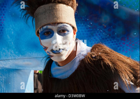 Portrait of a young masked man participating in the Carnival of Nice parade in costume. Stock Photo