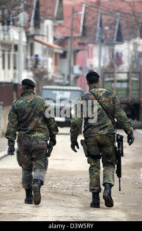 German Bundeswehr soldiers patrol the village Mitrovic, Kosovo, 13 ...