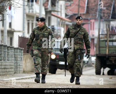 German Bundeswehr soldiers patrol the village Mitrovic, Kosovo, 13 ...