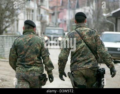 German Bundeswehr soldiers patrol the village Mitrovic, Kosovo, 13 ...