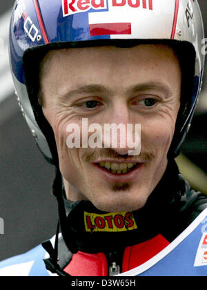 The Polish ski jumper Adam Malysz is pictured smiles at the 55th Four Hills tournament at the 'Bergisel Large Hill' in Innsbruck, Austria, Thursday, 04 January 2007. Photo: Peter Kneffel Stock Photo