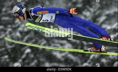 The photo shows Polish ski jumper Adam Malysz during his test jump at the 'Schattenbergschanze'-jump in Oberstdorf, Germany, Saturday, 27 January 2007. Photo: Matthias Schrader Stock Photo