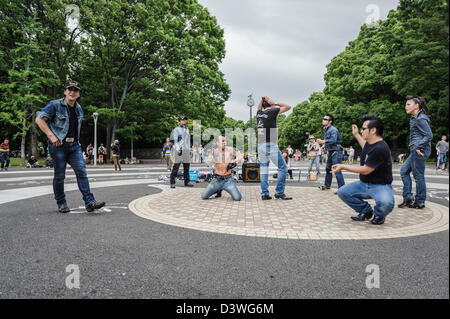 Group of people that gathers every weekend in Yoyogi park, Tokio. They dress and dance rockabilly, Japan, Asia Stock Photo