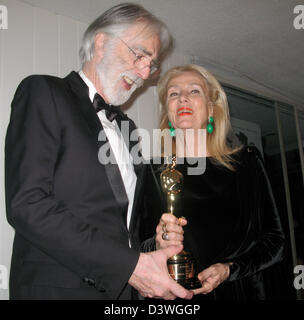 Austrian director Michael Haneke celebrates winning his first Oscar Award for his film 'Amour' with his wife Susanne at the residence of the Austrian consul after the 85th Academy Awards in Los Angeles, USA, 24 February 2013. Photo: Barbara Munker Stock Photo
