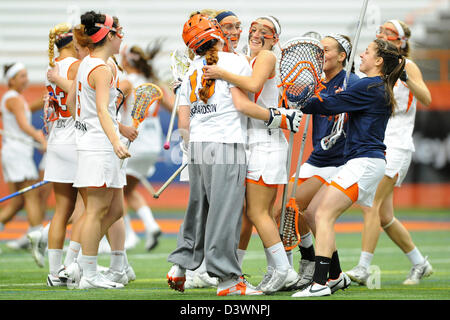 Feb. 24, 2013 - Syracuse, New York, U.S - February 24, 2013: Syracuse Orange players celebrate their 10-9 victory over the Virginia Cavaliers following an NCAA Women's Lacrosse game at the Carrier Dome in Syracuse, New York. Syracuse defeated Virginia 10-9. Stock Photo