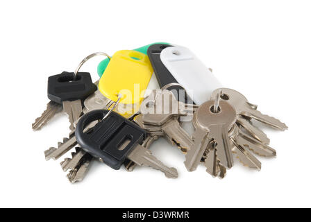 Eighteen keys are photographed on a white background Stock Photo