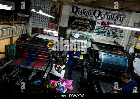 Colombian master printers prepare the ancient letterpress machines for ...