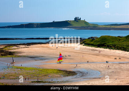 View from Low Newton-by-the-Sea towards Dunstanburgh Castle, Northumberland Stock Photo