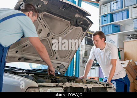 Small business practice of car garage repair shop Stock Photo