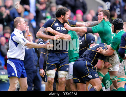 Edinburgh, UK. 24th February 2013. Referee Wayne Barnes tries to intervene as Jim Hamilton of Scotland and Donncha Ryan of Ireland square up to each other - RBS 6 Nations - Scotland vs Ireland - Murrayfield Stadium - Edinburgh - 24/02/13 - Picture Simon Bellis/Sportimage/Alamy Live News Stock Photo